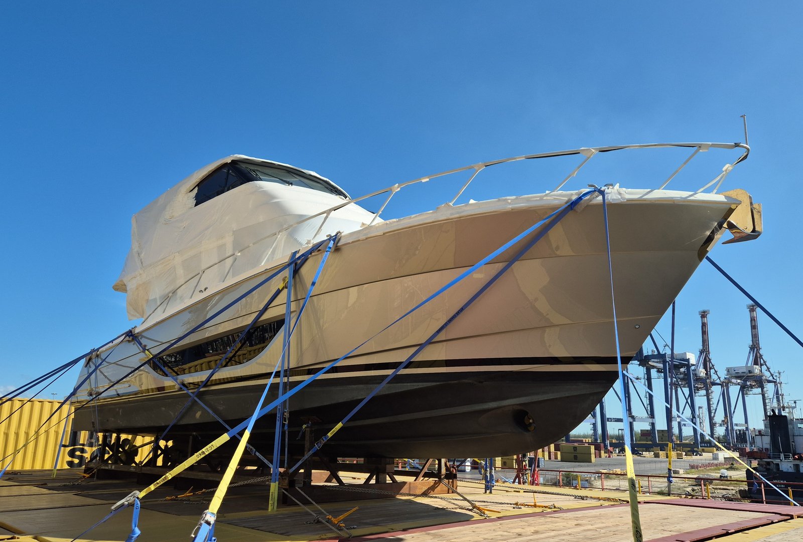 Yacht surveyed on transport cradle during discharge