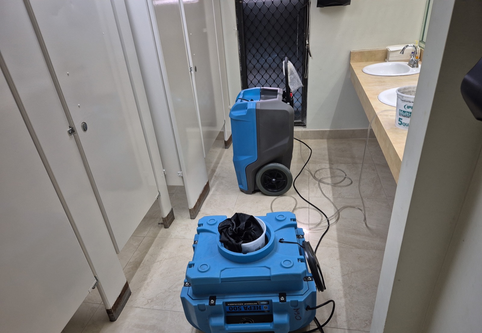 HEPA air scrubbers and dehumidifiers deployed on an OEM mold remediation job